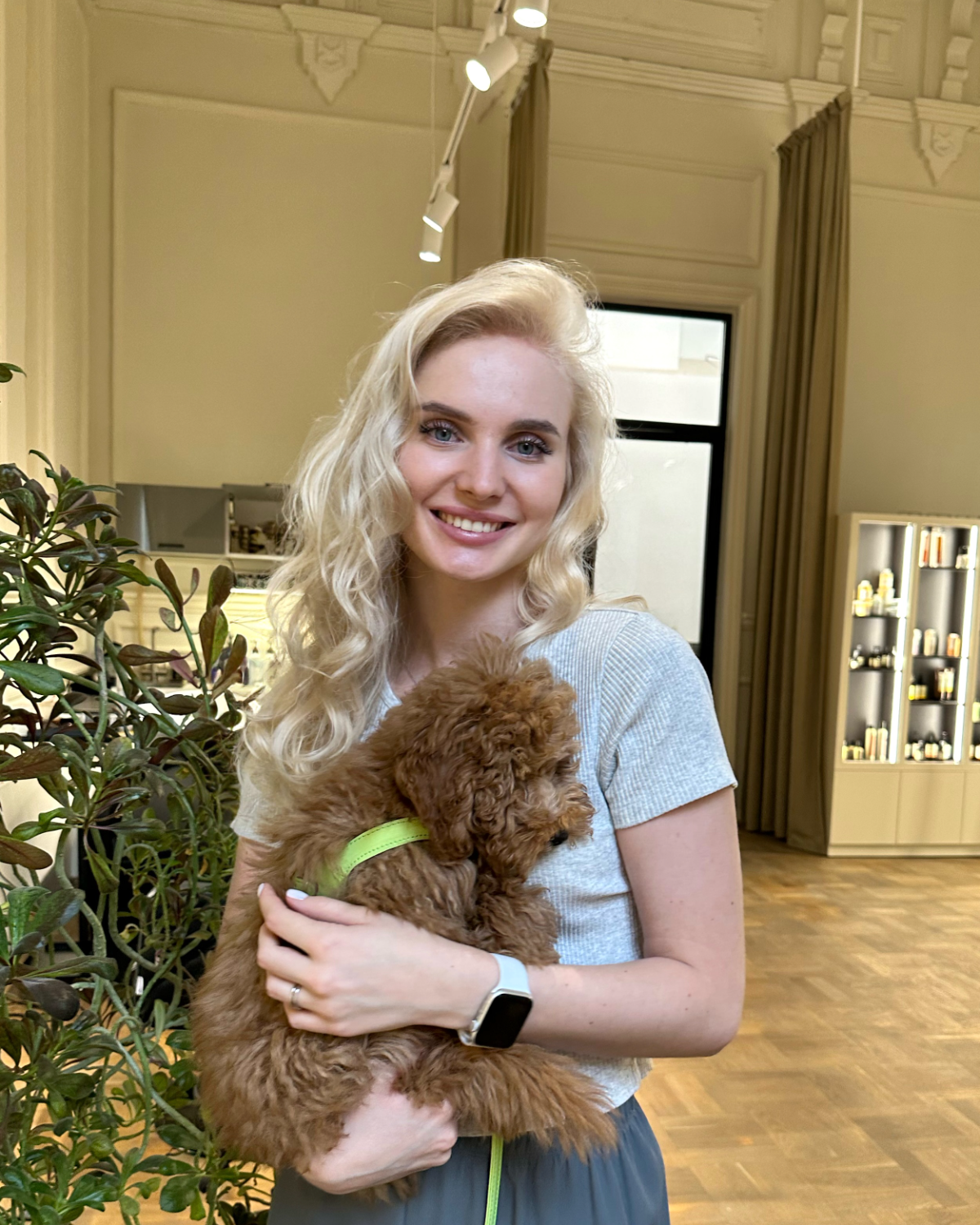 holding a puppy in a quiet room